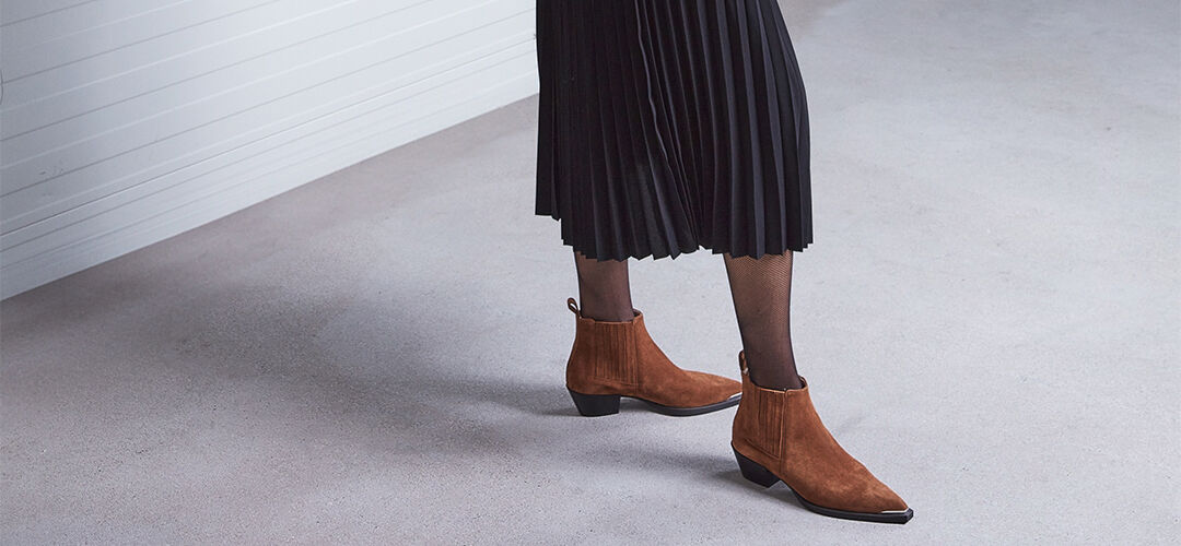 Hoge laarzen combineren 6 trendy boots met outfit inspiratie Assem