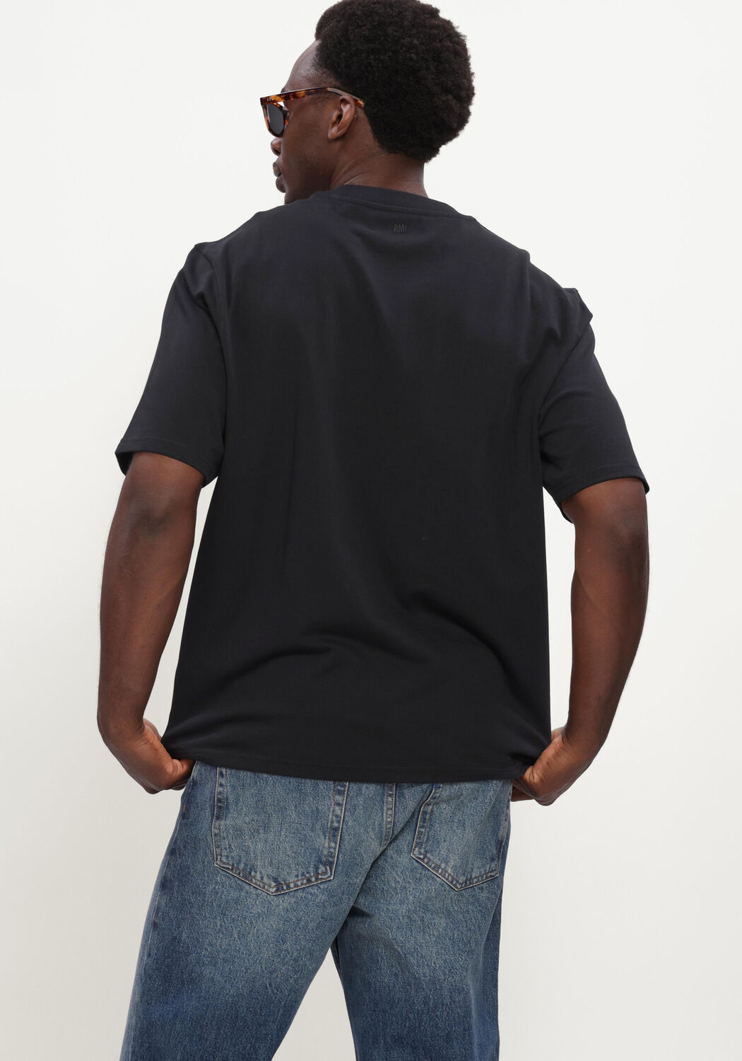 Zwarte AMI PARIS T-shirt QUOTA - TSHIRT WITH TONAL EMBOSSED BIG AMI DE COEUR - large