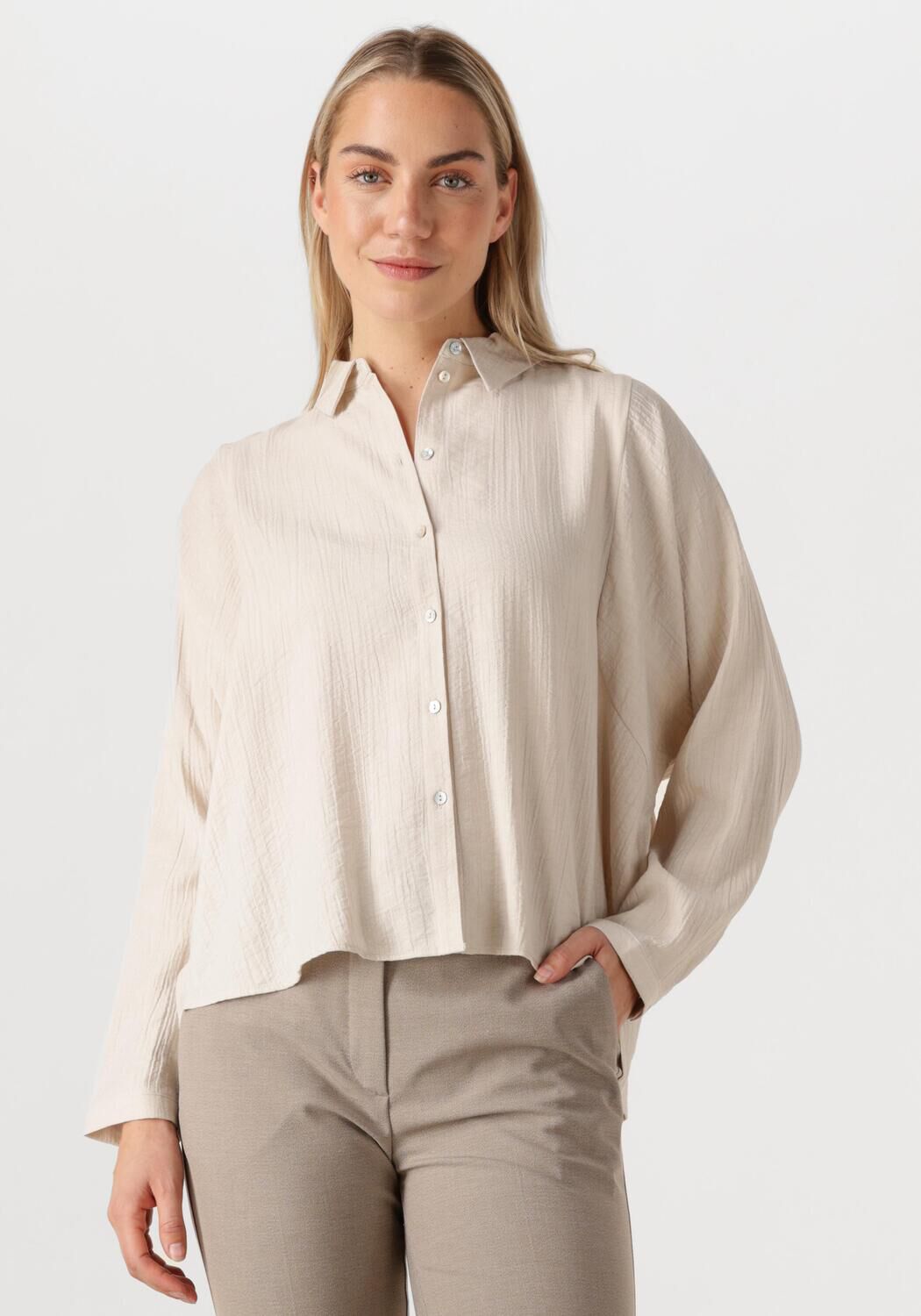 Knit-ted Blouse
Dames Rosan, Maat: L, Kleur: Creme afbeelding