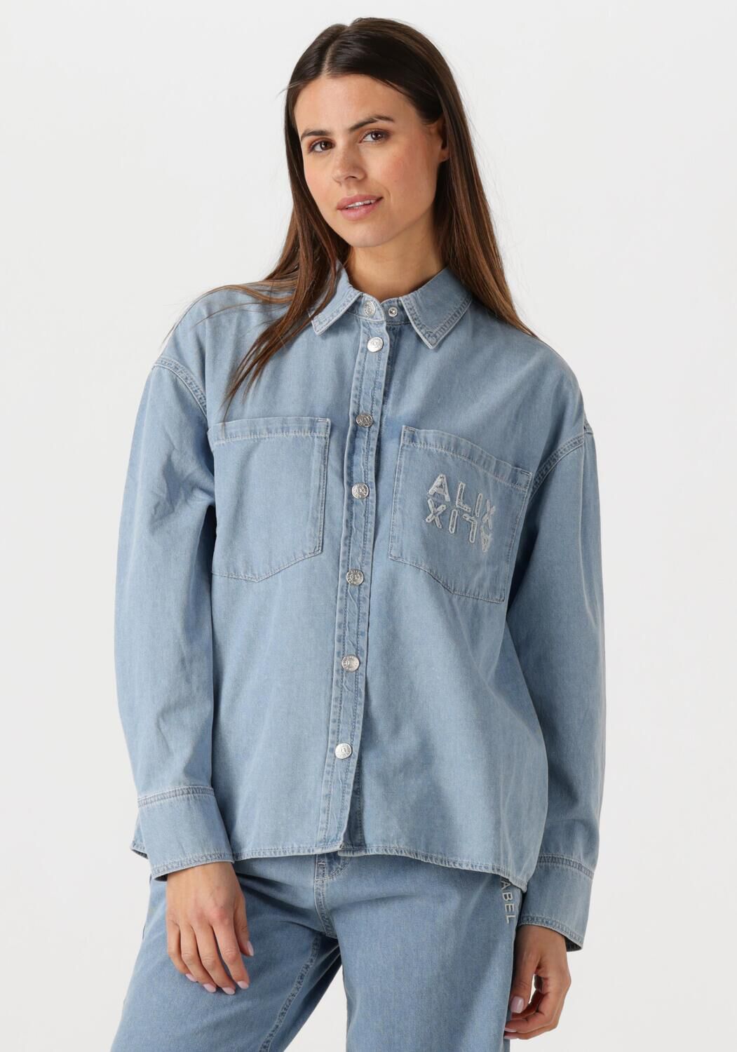 Alix the Label Blouse
Dames Ladies Woven Chambray Peplum Denim Blouse, Maat: L, Kleur: Blauw