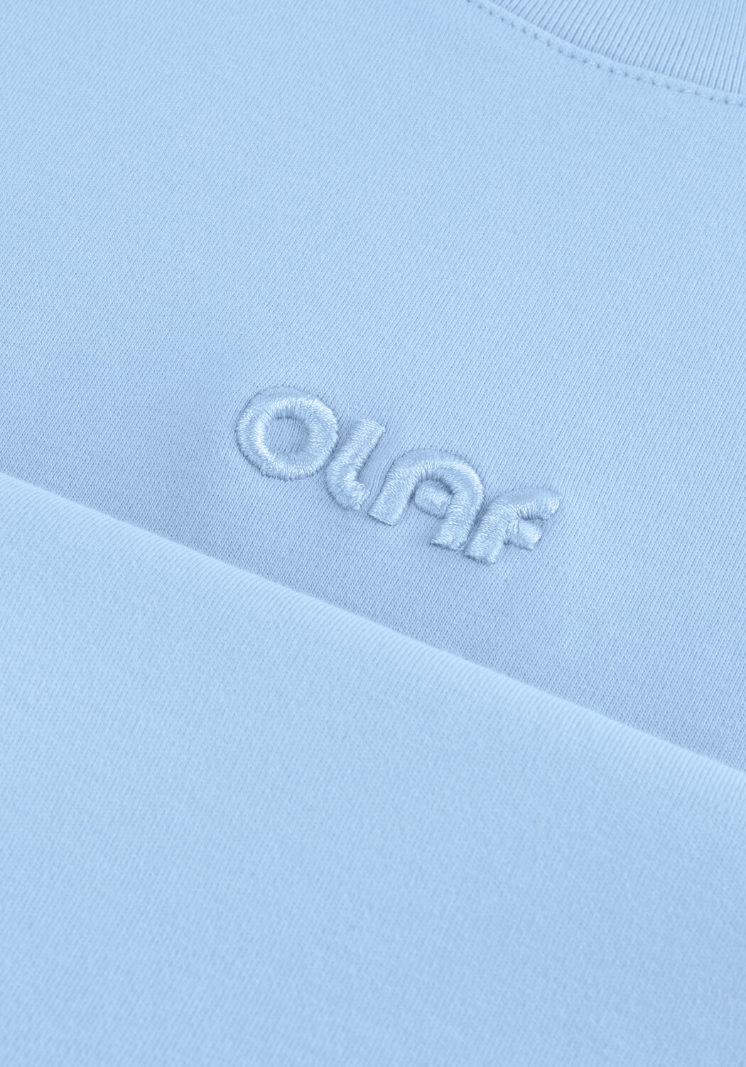 Lichtblauwe OLAF HUSSEIN T-shirt RETRO LOGO BOXY TEE - large